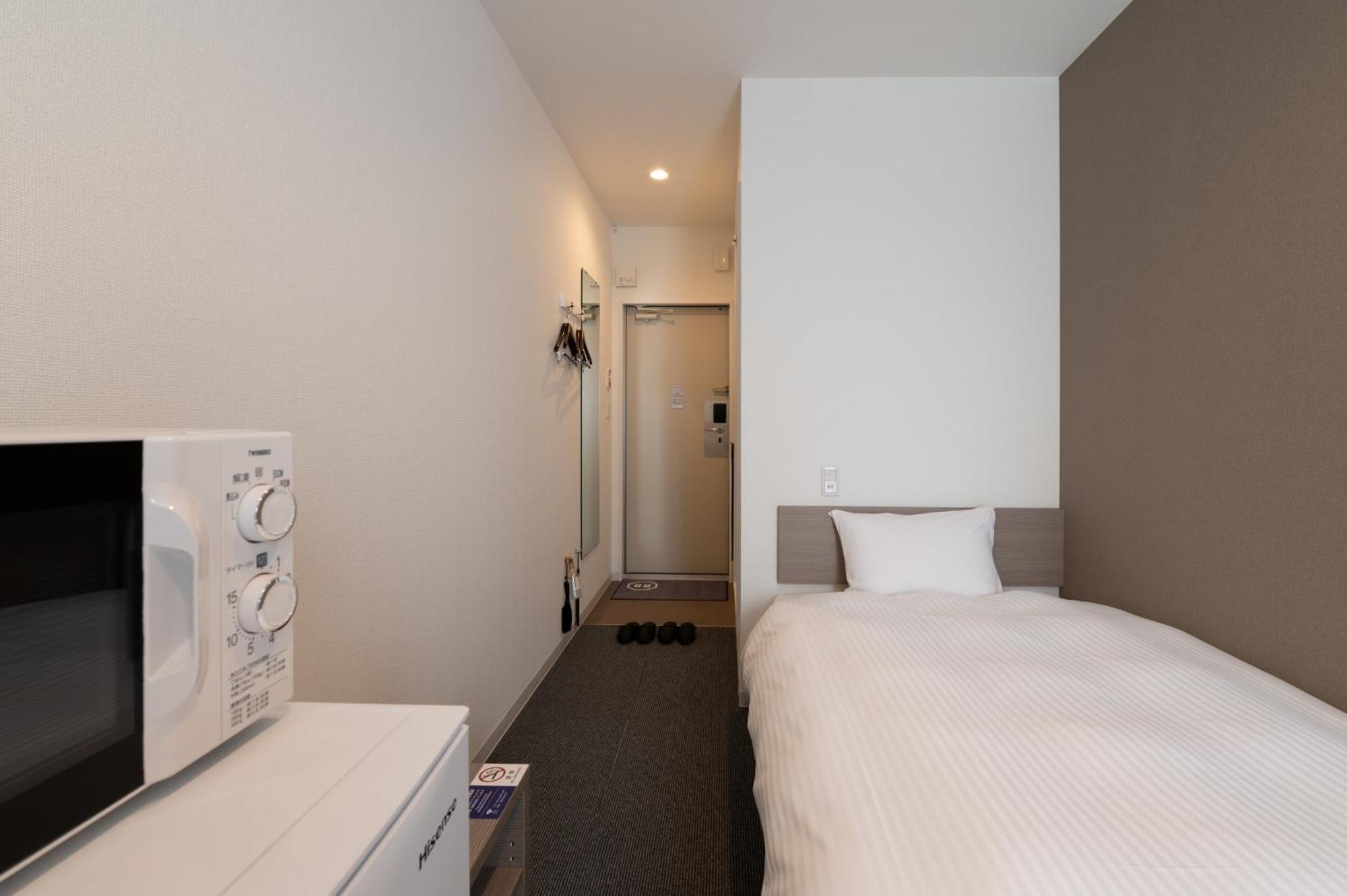 Hotel R9 The Yard Koka Bagian luar foto