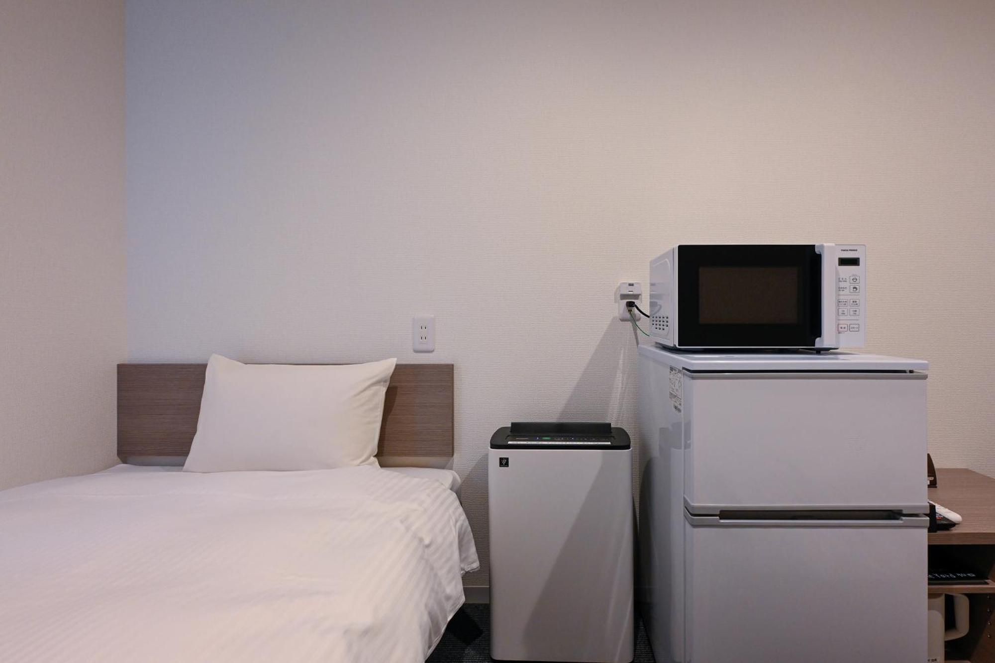 Hotel R9 The Yard Koka Bagian luar foto
