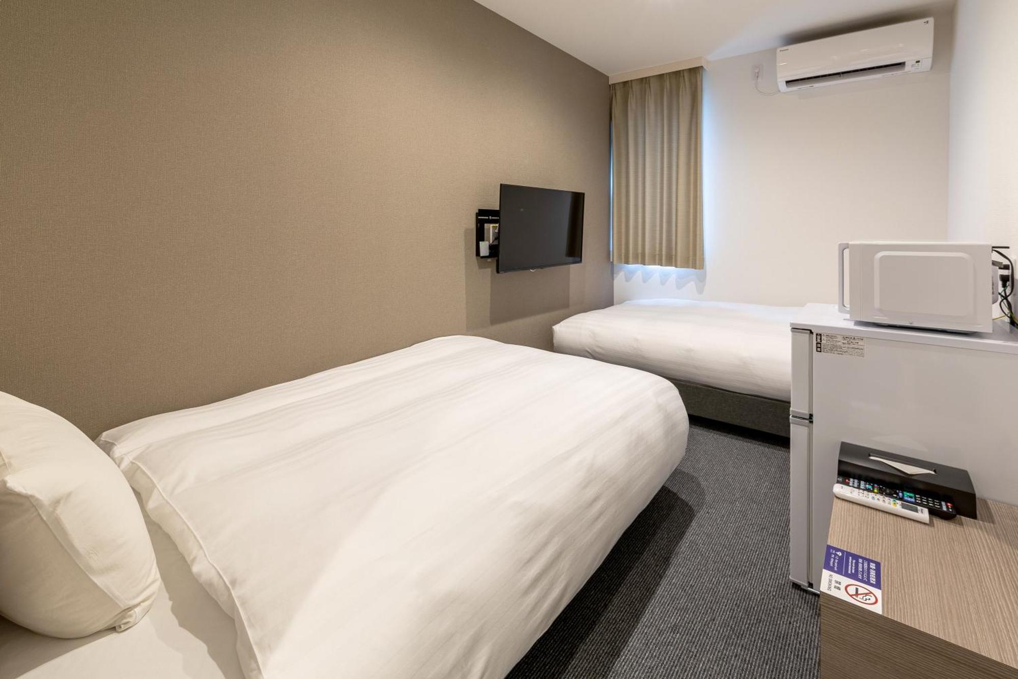 Hotel R9 The Yard Koka Bagian luar foto